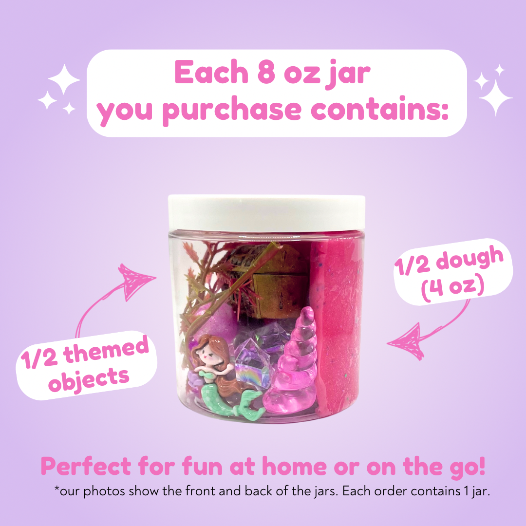 Clear jar showing the Enchanting Mermaid Playdough Sensory Kit with half pink dough and half themed objects including a mermaid figure and decorative elements, ideal for sensory play at home or on the go