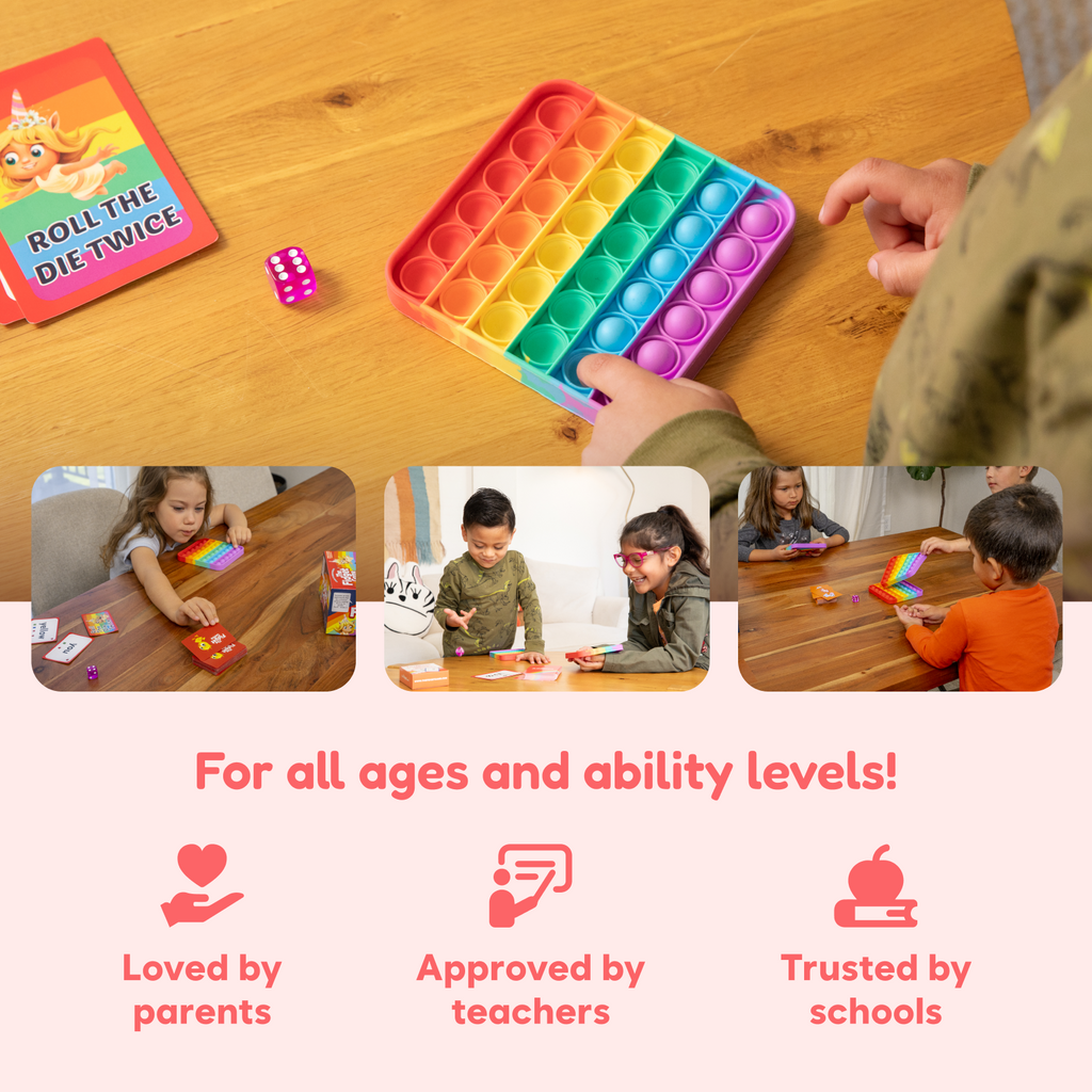 Child playing with a colorful rainbow pop-it fidget toy alongside cards and a die while using The Fidget Game: Sight Words Edition | Learning Card Game for Kids with ADHD & Sensory Needs at a wooden table.