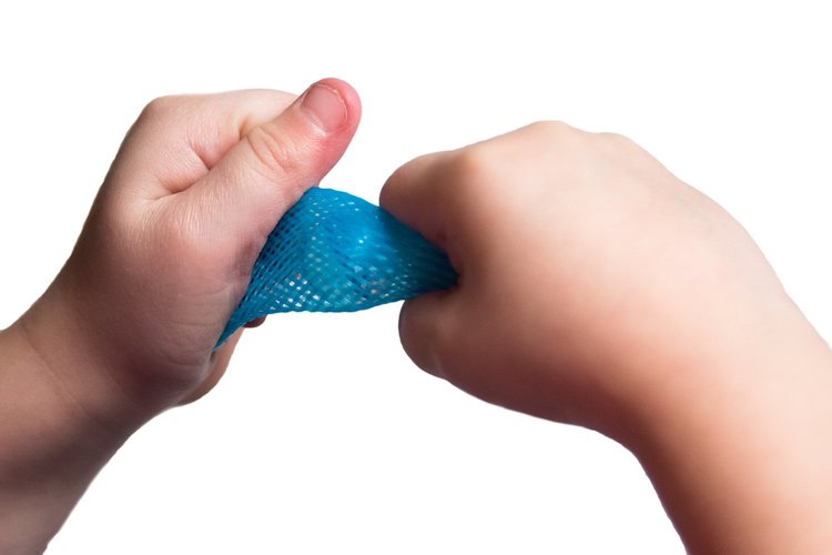 Child's hands squeezing a blue textured sensory fidget toy, demonstrating stress-relief and calming effects of BOINKS! Soothing Fidget Toys for Autism/ADHD 6-Pack.