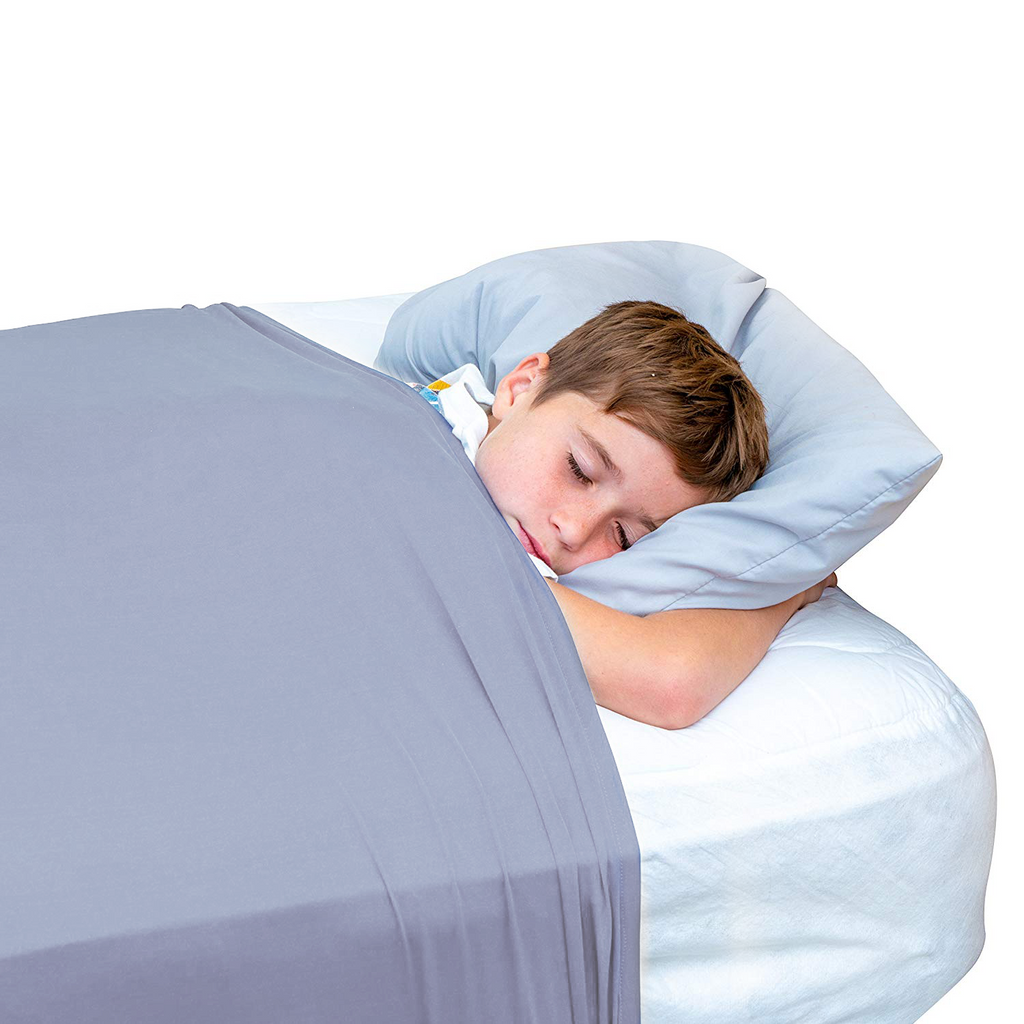 JahBri sensory compression bed sheet fitted corner detail on a child's mattress