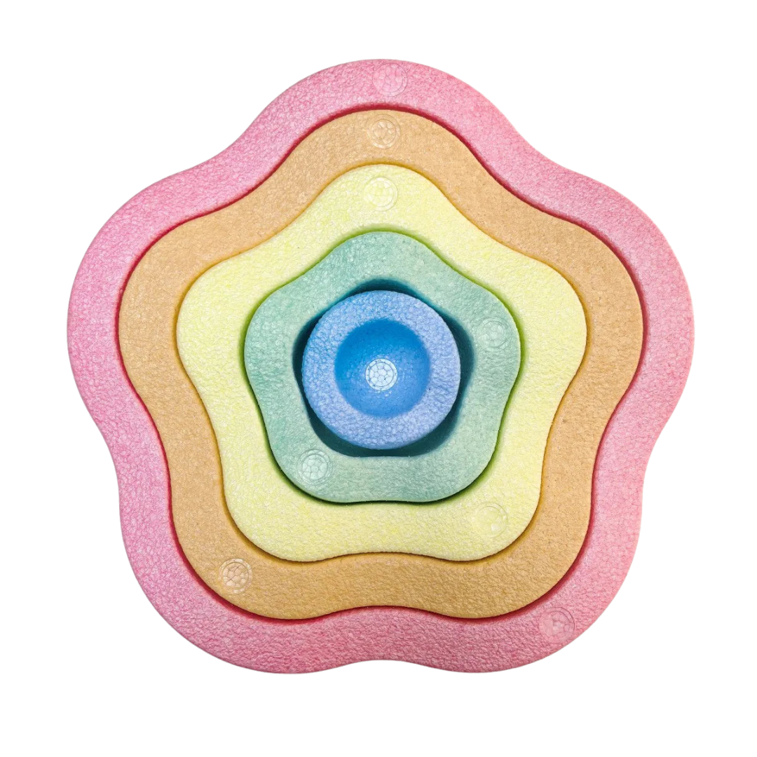 Colorful Kids Foam Stepping Stones Balance Set arranged in a layered flower shape with vibrant pink, orange, yellow, green, and blue foam pieces for sensory and balance play.
