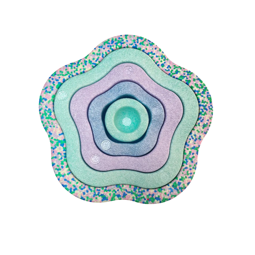 Colorful Kids Foam Stepping Stones Balance Set showing a top view of stacked pastel blue, purple, and green star-shaped foam pieces designed for sensory play and balance activities.