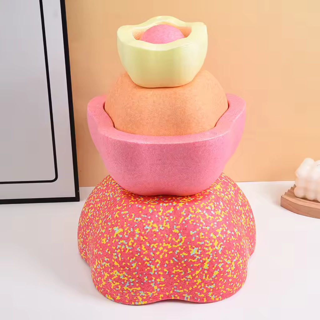 Stacked colorful foam pieces in playful shapes designed for balance and sensory play, part of the Colorful Kids Foam Stepping Stones Balance Set promoting fine motor skills and coordination.