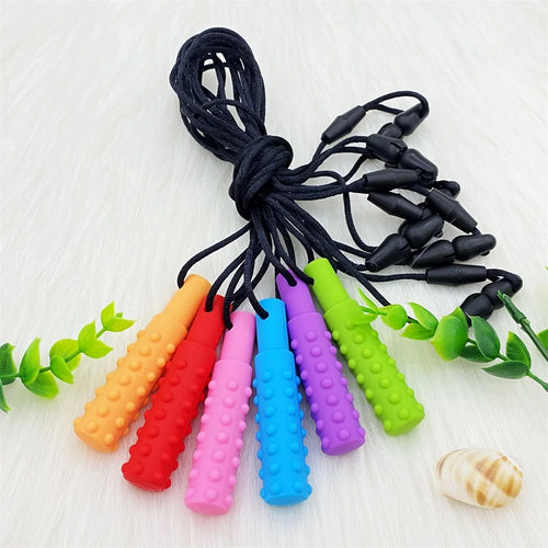 3PCS Sensory Chew Necklace A sensory oral aid teether toy for autism, hyperactivity, infant breastfeeding or special needs featuring colorful textured chewable pendants on black cords.