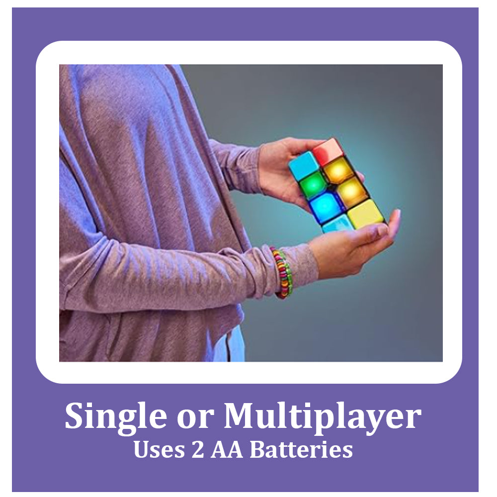 Person holding a colorful illuminated Magic Cube Electronic Fidget Game | Flip, Slide & Match Memory Toy for Kids & Adults, demonstrating its interactive lights and design.
