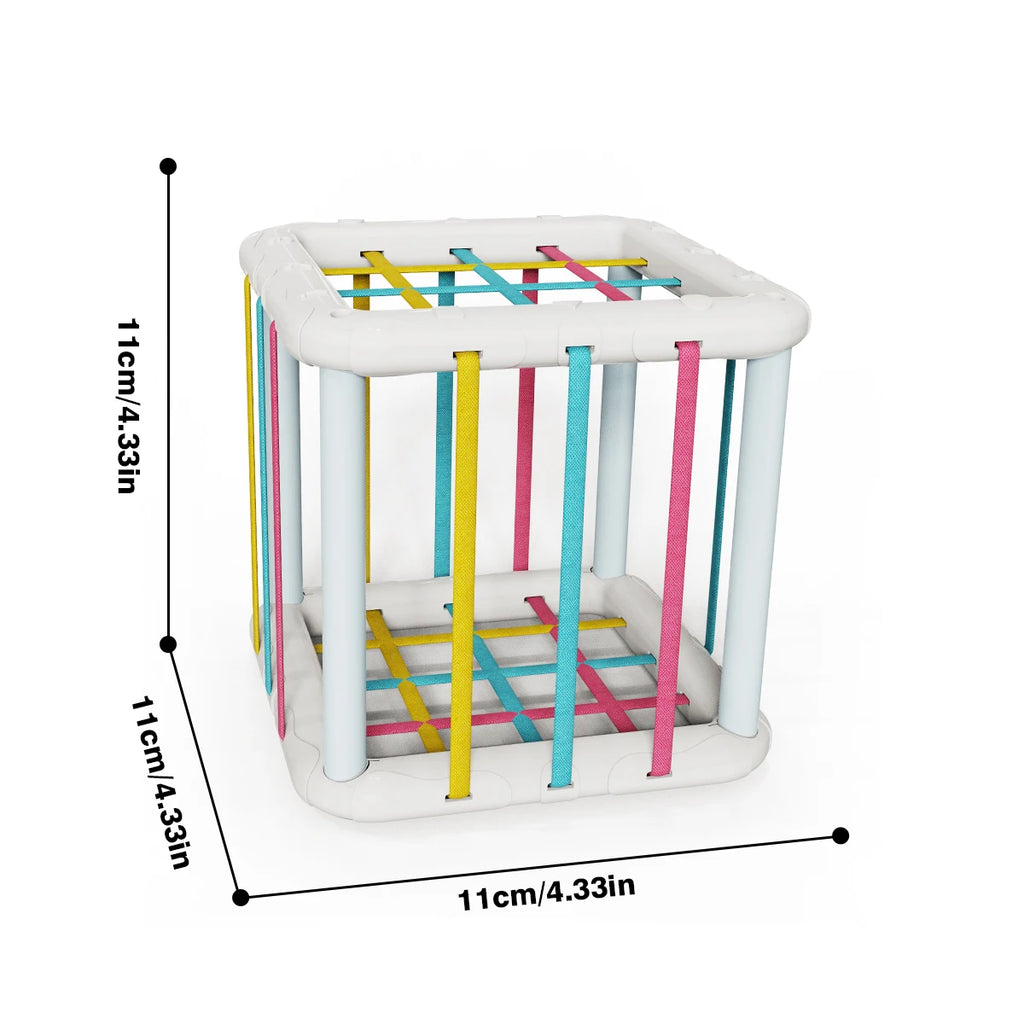 Montessori Shape Sorting Blocks for Toddlers featuring a soft cube design with colorful vertical and horizontal straps to encourage sensory play and fine motor skills development.
