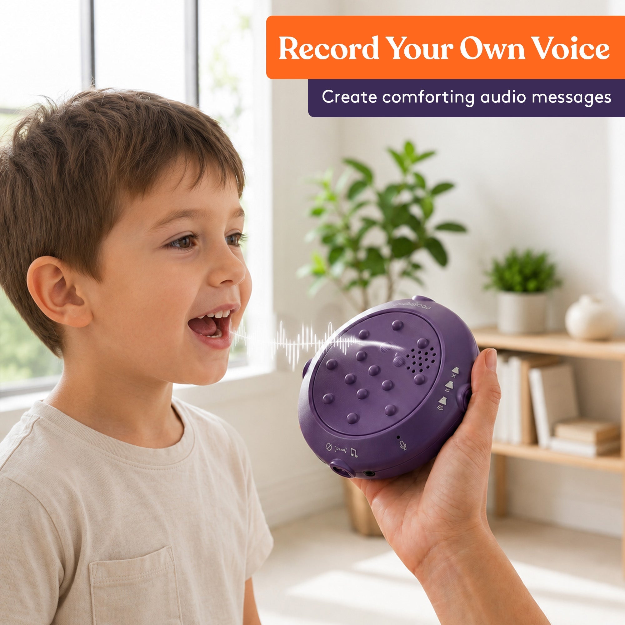 Child smiling while a hand holds a purple sensory toy with textured bumps and speaker, demonstrating the voice recording feature of the Sensory Vibrating Pillow – Pressure-Activated Calming Support for Kids & Adults, 12” Plush with Textured Bumps, 3 Vibration Modes, Music & Voice Recording (Blue).
