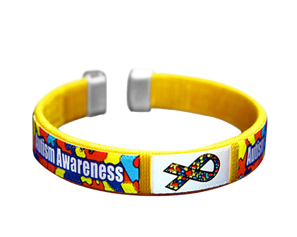 Autism Awareness Bangle Bracelets | Puzzle Piece Jewelry for Adults featuring a yellow adjustable band with colorful puzzle piece accents and an autism awareness ribbon design.