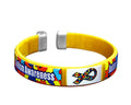 Autism Awareness Bangle Bracelets | Puzzle Piece Jewelry for Adults featuring a yellow adjustable band with colorful puzzle piece accents and an autism awareness ribbon design.