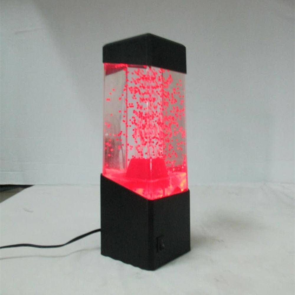 LED Jellyfish Sensory Lamp | Calming Visual Night Light for Autism & ADHD with glowing red light and bubble effect in a black rectangular base for sensory stimulation and home decor.