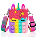 Pop Fidget Shoulder Bag | Wearable Sensory Toy Backpack for Kids featuring a colorful unicorn design with pop fidget bubbles, adjustable rainbow strap, and calming sensory toy elements.